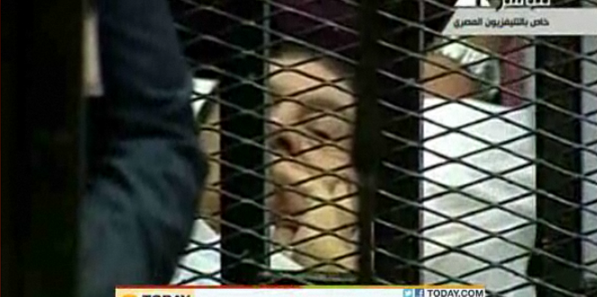 Bedridden, Caged, Mubarak Rejects Charges As Trial Starts (VIDEO)